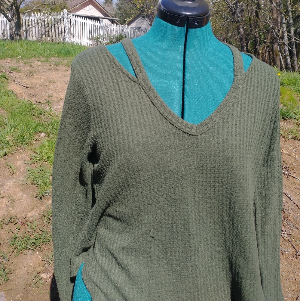 Sweater with cut outs